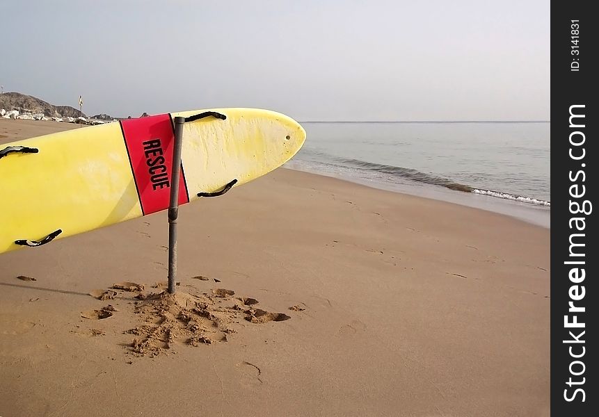 Life guard board at the ready on the beach at Fujairah, UAE. Life guard board at the ready on the beach at Fujairah, UAE