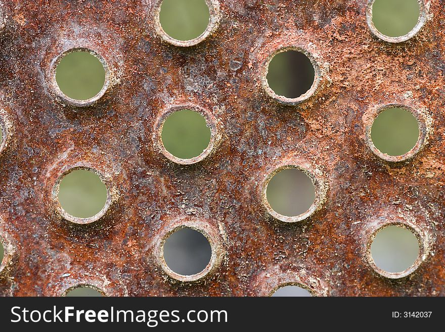 Rusted iron surface, intended as background or wallpaper. Rusted iron surface, intended as background or wallpaper