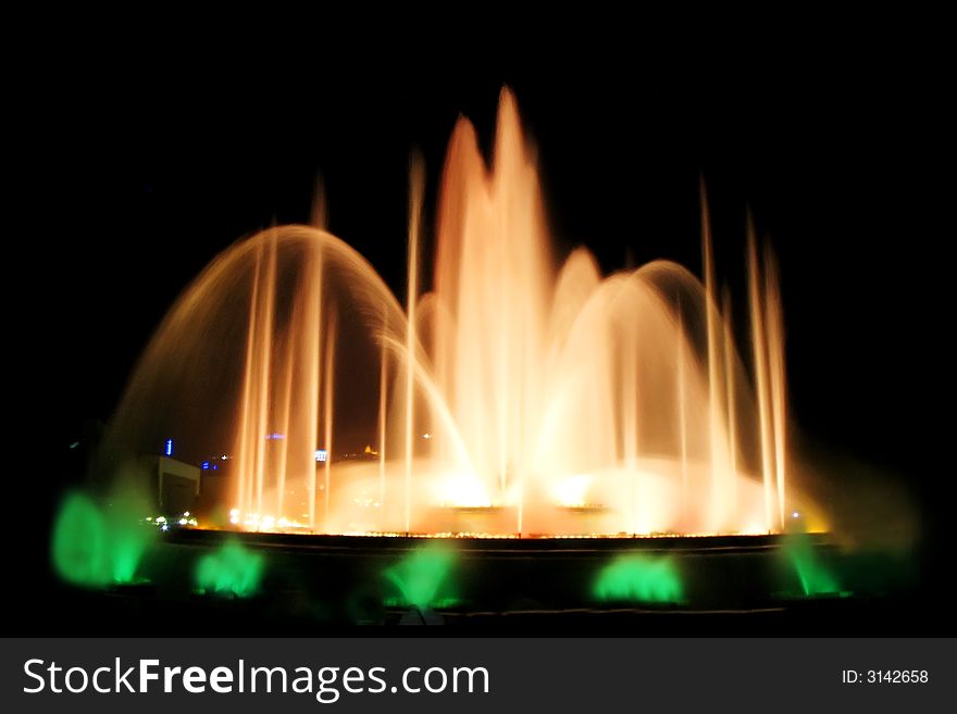 Montjuic magic fountain. A lights,colors and music spectacle at night, displayed in magic fountains situated in Barcelona (Spain)