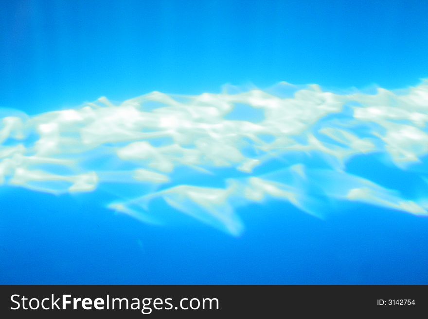 The sun’s rays on the bottom of a pool. The sun’s rays on the bottom of a pool.