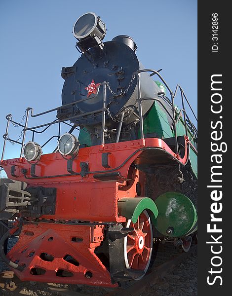 Old Russian steam locomotive at the railway station