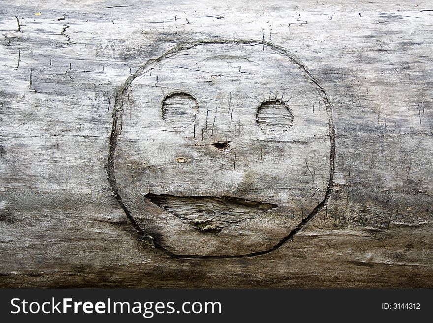 Smile Graven In Wood