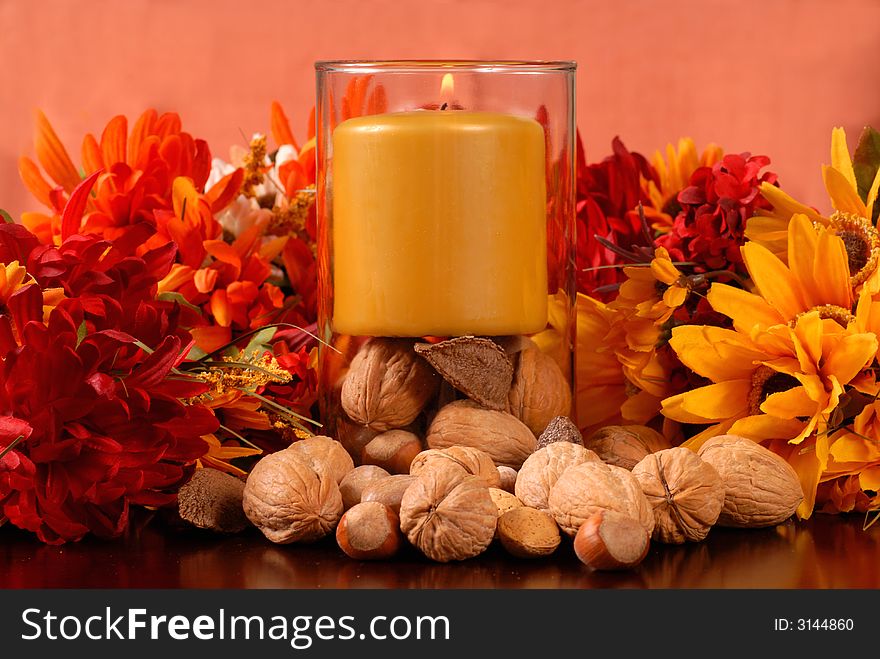 Candle with nuts