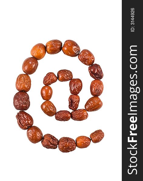 Email symbol made from Jjujube fruit (Chinese dates) isolated on white with a clipping path. Email symbol made from Jjujube fruit (Chinese dates) isolated on white with a clipping path