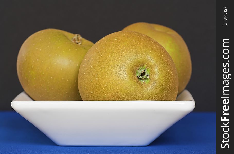 Golden Apples in a Bowl