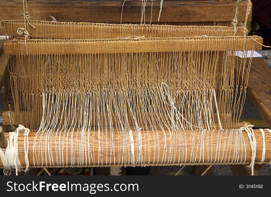 Native American rustic wooden loom. Native American rustic wooden loom