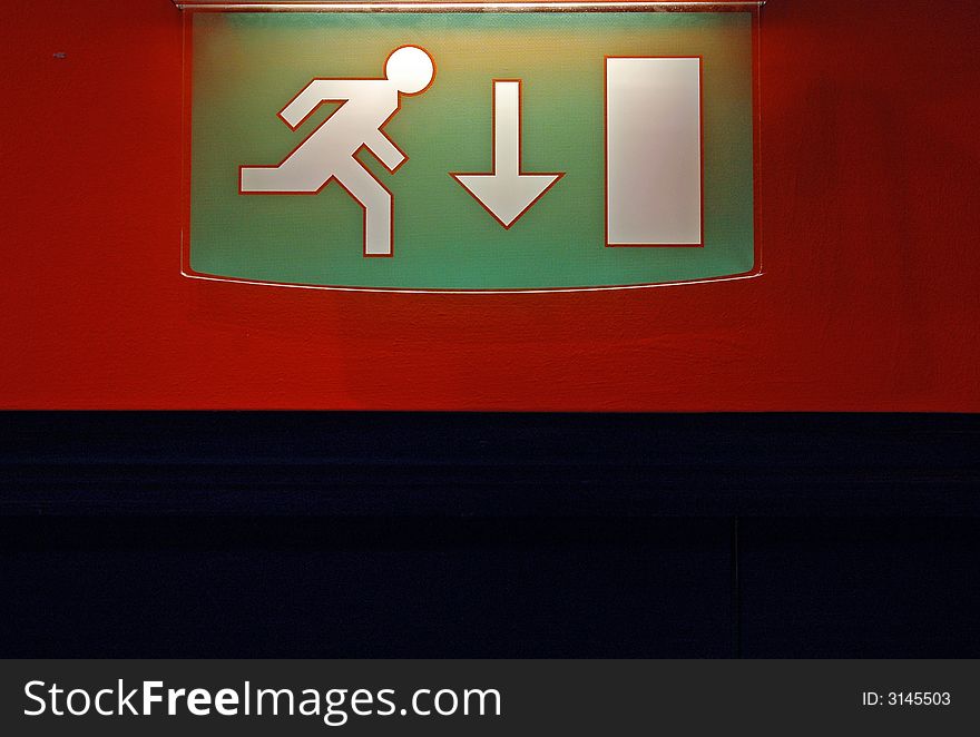 Emergency Exit sign mounted onto wall