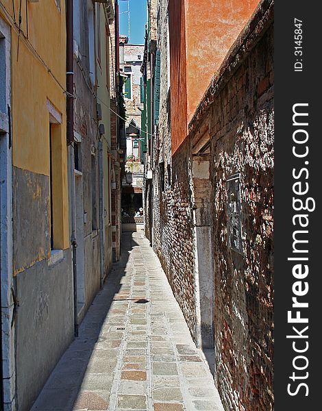 A typical corner of Venice Italy: ancient buildings, gondola and other particular architectures. A typical corner of Venice Italy: ancient buildings, gondola and other particular architectures