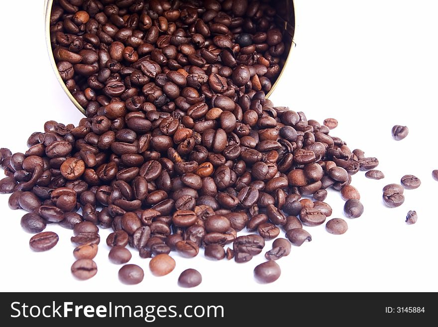 Coffee beans over white background.