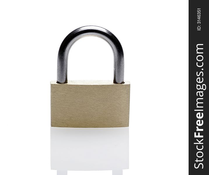 Closed Brass Metal Padlock On A White Background With Reflection. Closed Brass Metal Padlock On A White Background With Reflection