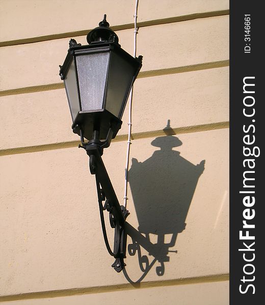 Photo of retro-styled lantern on an building