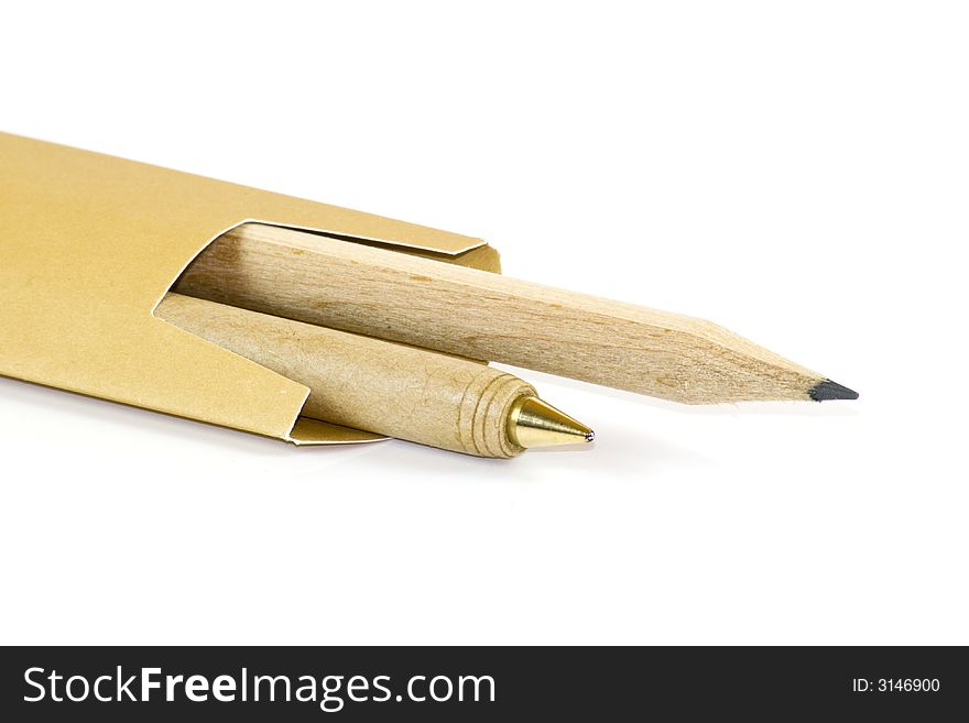 Ballpoint and pencil isolated on white background