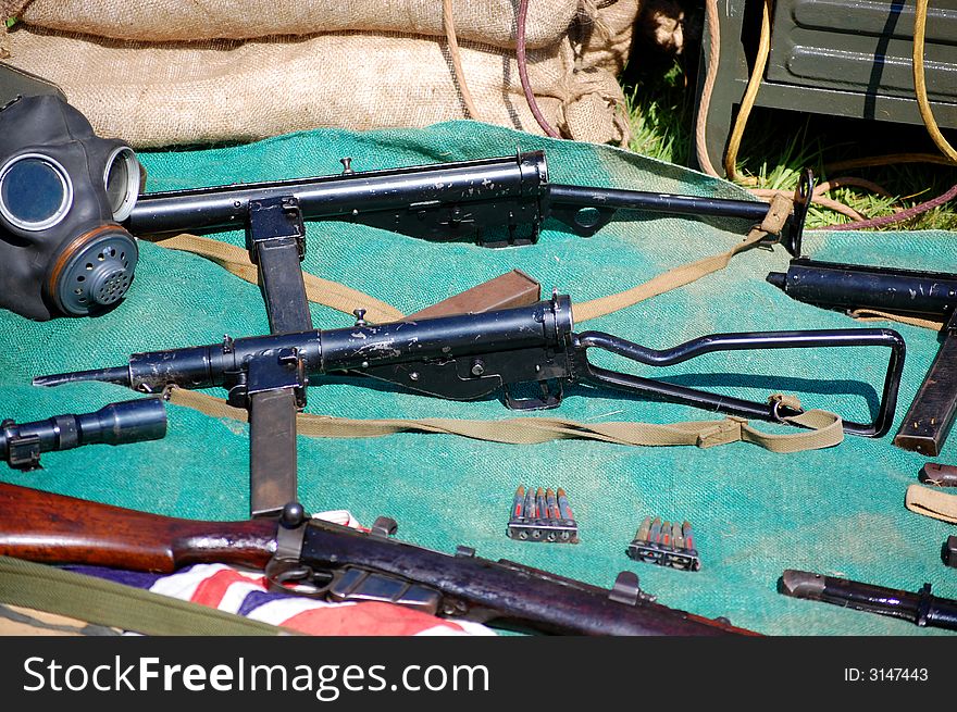 Sten Guns & WWII relics, gas mask 303 enfield, union flag jack, tele sight, bayonet, ammo