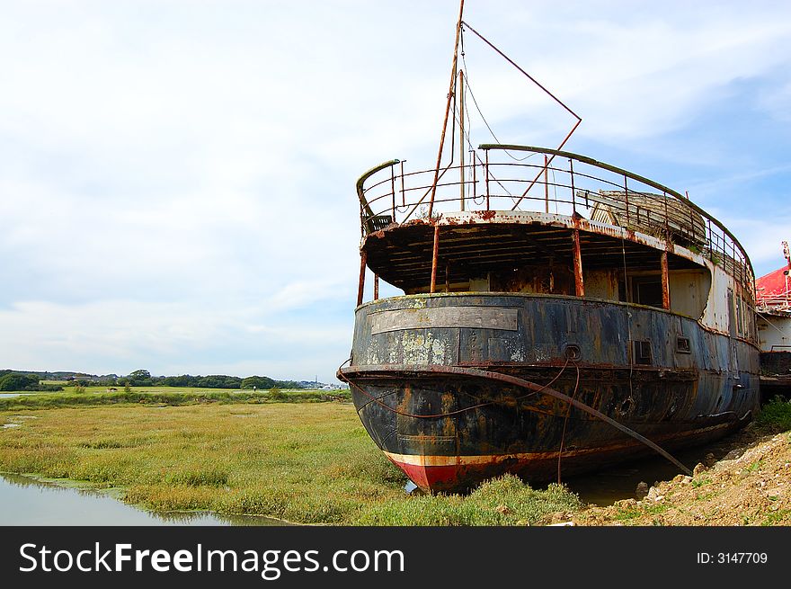 Paddle steamer the Ryde Queen in semi dry dock rusting away in need of restoration