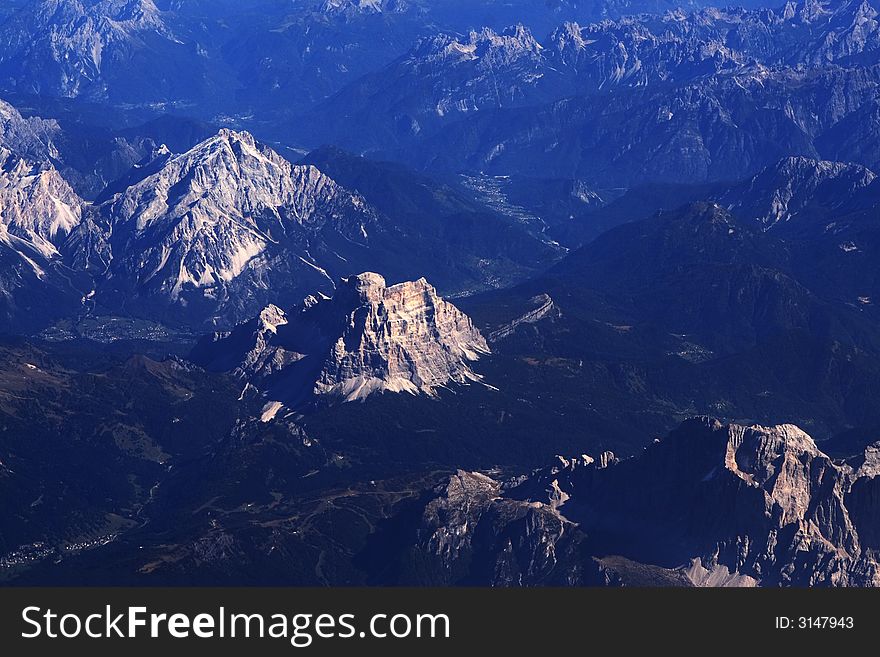 Aerial view of Alps. Overall picture has a (natural for this subject) blue shift. Aerial view of Alps. Overall picture has a (natural for this subject) blue shift.