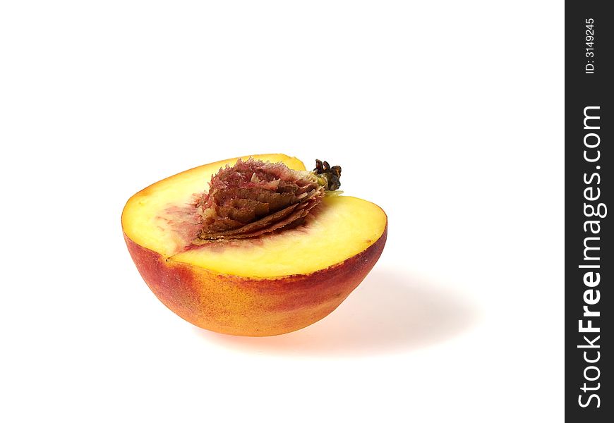 Half of tasty juicy peaches on a white background. Half of tasty juicy peaches on a white background