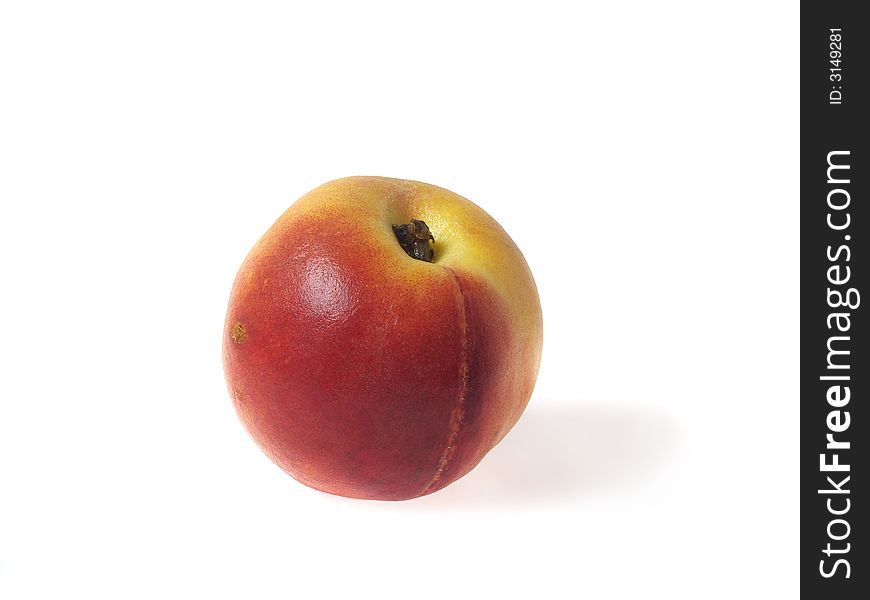 Half of tasty juicy peaches on a white background whith clipping mask. Shadows is not included in clipping mask