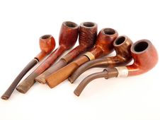 Six Smoking Pipes Lying Together Isolated On White Royalty Free Stock Images Six Smoking Pipes Lying Together Isolated On White Royalty Free Stock Images