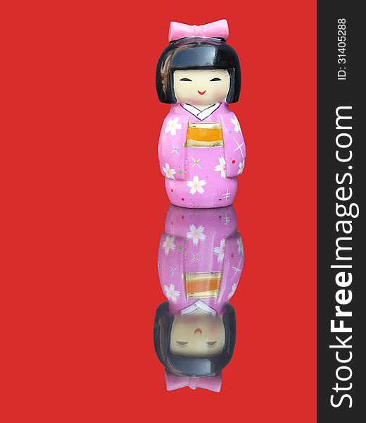 Porcelain Chinese Figurine With Mirror Image  On A Red Background