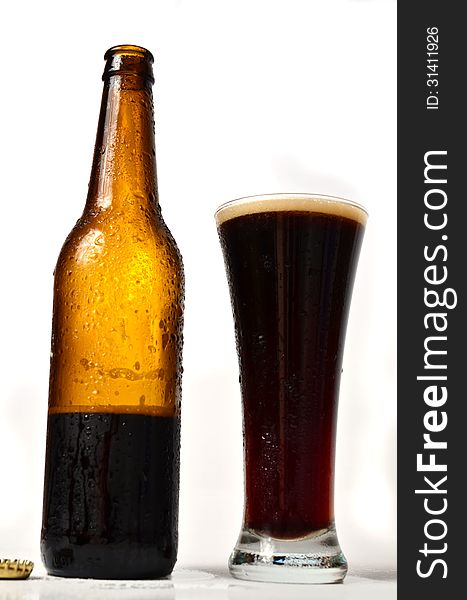 A bottle of beer on white background. A bottle of beer on white background