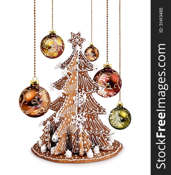 Decorative gingerbread tree and Christmas glass balls. Decorative gingerbread tree and Christmas glass balls