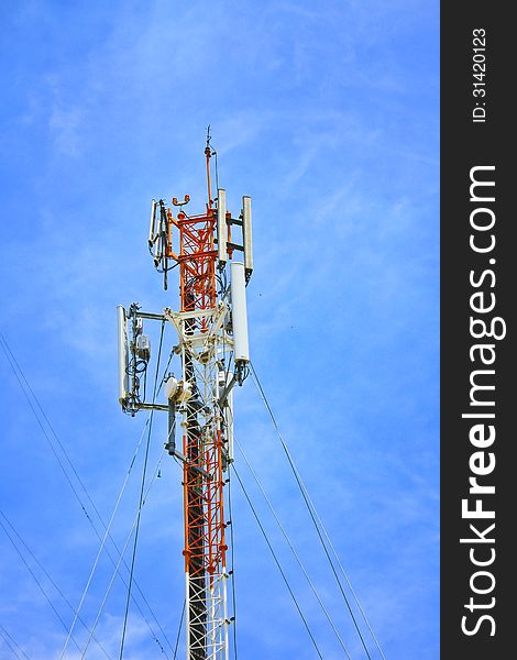 Telecommunication tower on blue sky