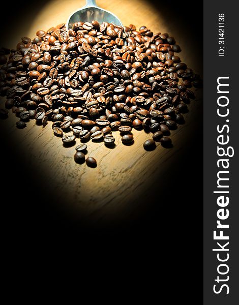 Coffee beans in the dark with lighting. Coffee beans in the dark with lighting