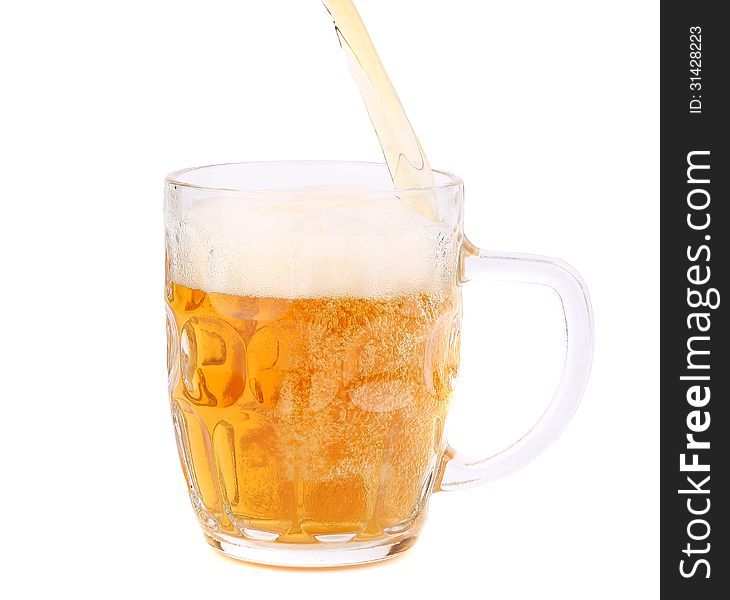 Beer pouring into beer mug on a white background