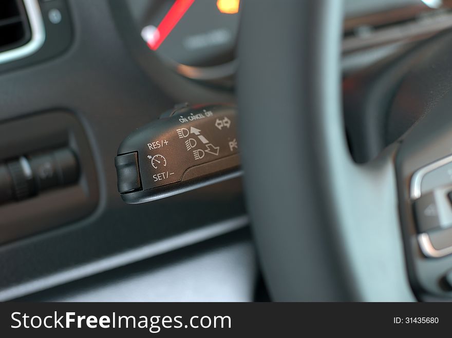 Cruise control stick which is located behind the wheel. Cruise control stick which is located behind the wheel