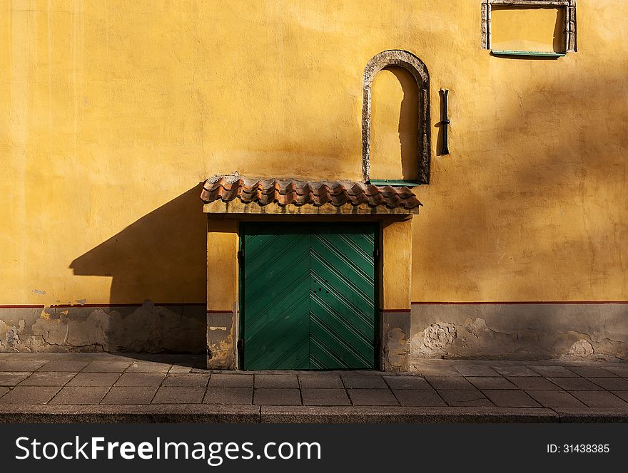 Shadow of green gate falling on yellow wall. Image no 207. Shadow of green gate falling on yellow wall. Image no 207.