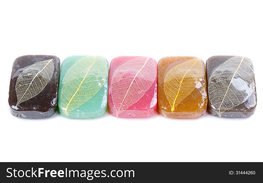 Colorful handmade soap on white background