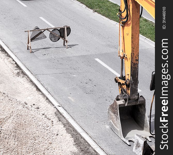 Scoop on a road construction site.