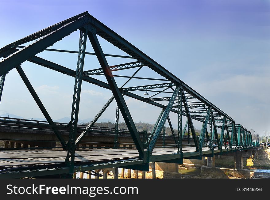 Historical Iron Bridge Cross River, Cloudy and Blue Sky