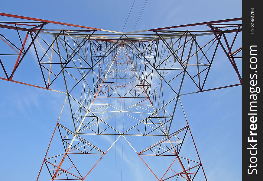 Structure and line of high voltage tower in sunny day