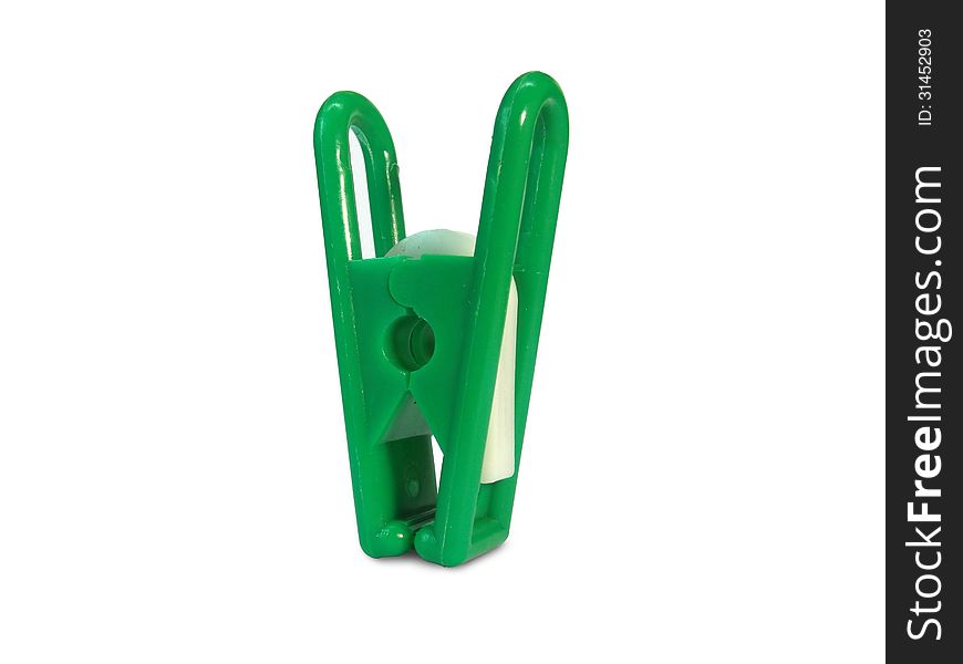 The pin made of green plastic with white plastic spring. The pin made of green plastic with white plastic spring
