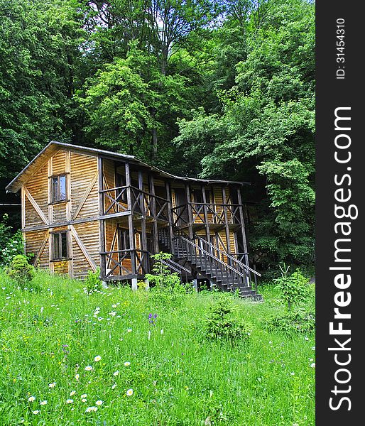 Wooden house in the forest ( can be a hotel)