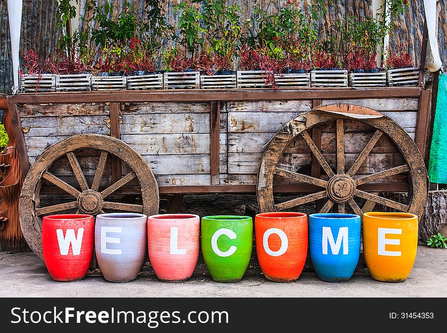 Welcome sign on colorful pottery. Welcome sign on colorful pottery