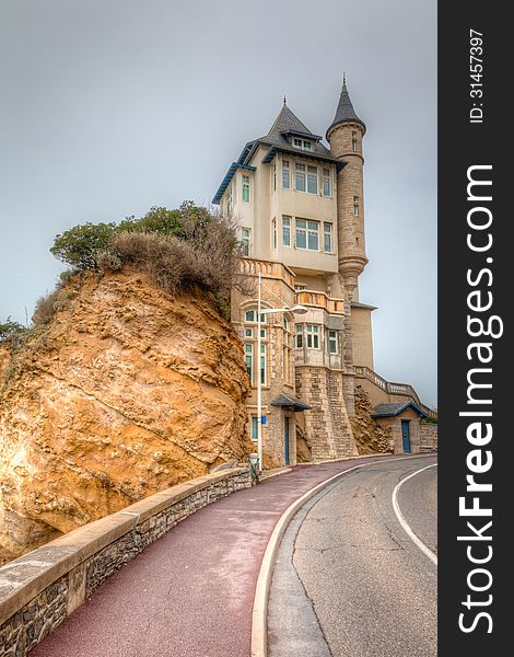 Seaside castle on a hill in Biarritz, Basque region of southern France. This is a HDR image. Seaside castle on a hill in Biarritz, Basque region of southern France. This is a HDR image.