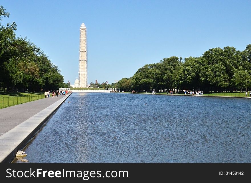 The Washington Monument Under Reconstruction.