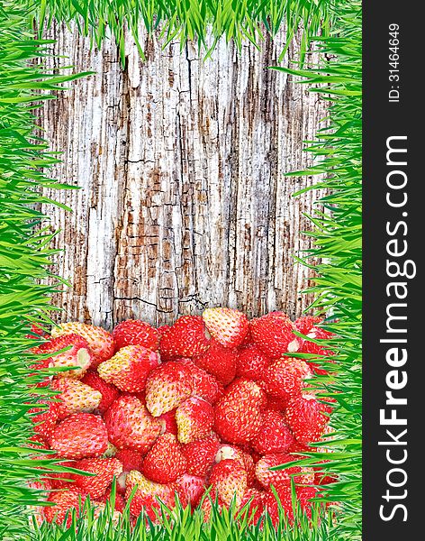 Strawberry On A Wooden Background With A Frame Made Of Grass.