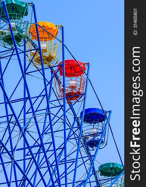 Lonely Colorful Ferris Wheel on Weekend