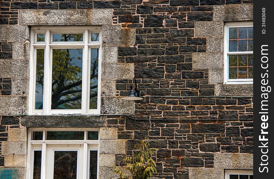 Old brick exterior wall and window in Halifax. Old brick exterior wall and window in Halifax