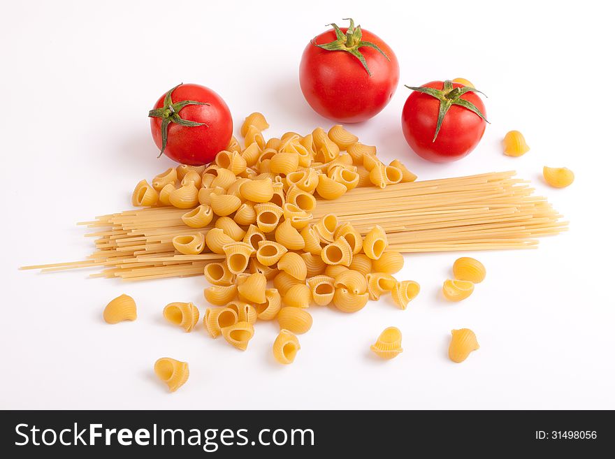 Raw pasta with cherry tomatoes. Raw pasta with cherry tomatoes