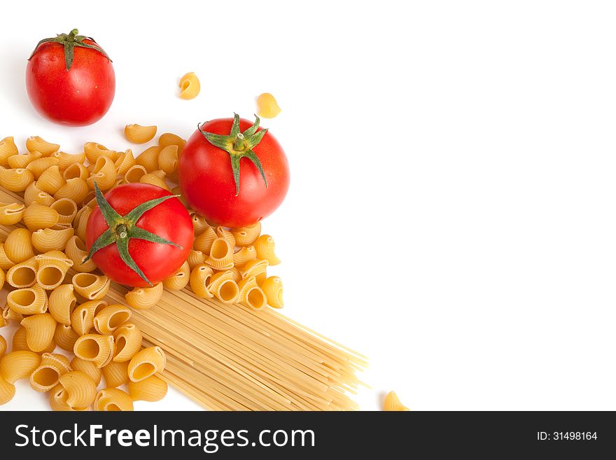 Raw pasta with cherry tomatoes with white space for your text here. Raw pasta with cherry tomatoes with white space for your text here