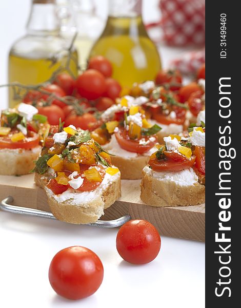 Appetizer called Bruschetta with oil and tomato