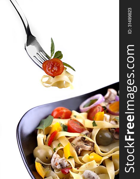 Italian pasta tagliatelle with vegetables