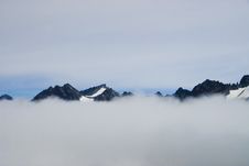 Mountains And Clouds In Alaska Stock Images