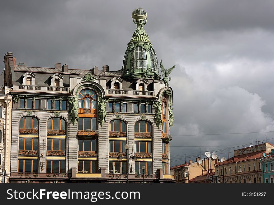 Antique house is photographed on a grey sky