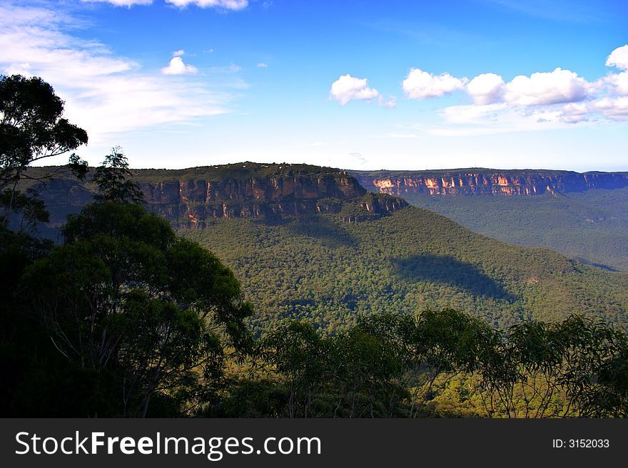 The Three Sisters are famous rock formation in the Blue Mountains of New South Wales, Australia. The Three Sisters are famous rock formation in the Blue Mountains of New South Wales, Australia