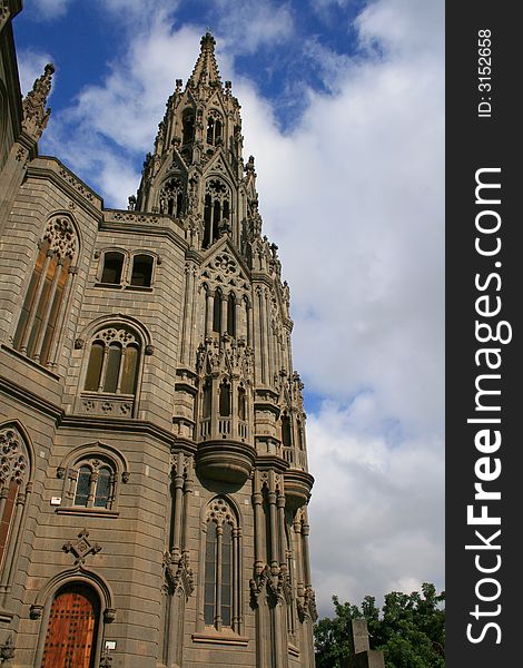 Belfry tower of San Juan cathedral in Arucas, Great Canary, in neogothic style. Belfry tower of San Juan cathedral in Arucas, Great Canary, in neogothic style